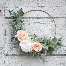 DIY an easy spring hoop wreath for above your changing table